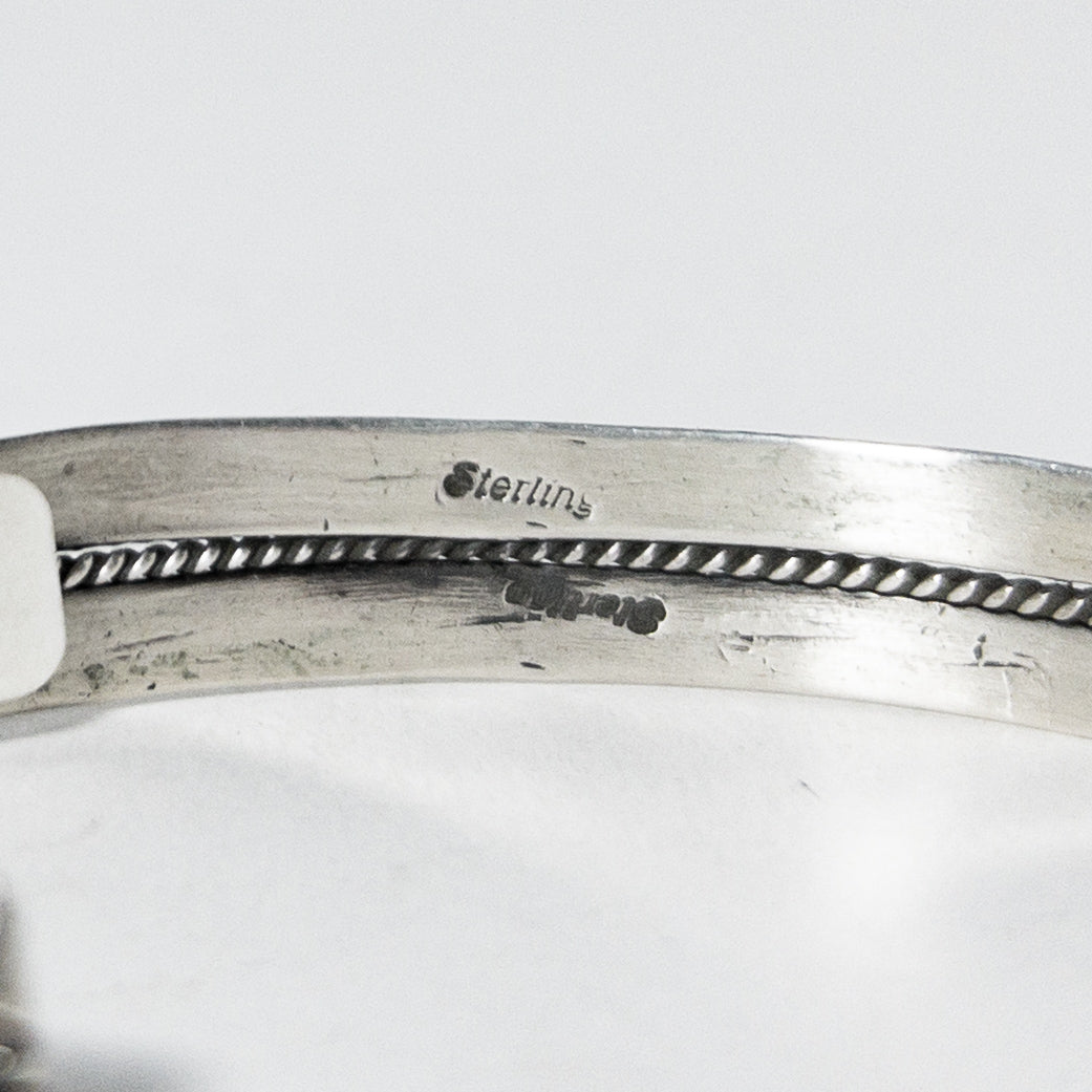 NAVAJO STAMPED SILVER BRACELET by ROBERT CADMAN var.1