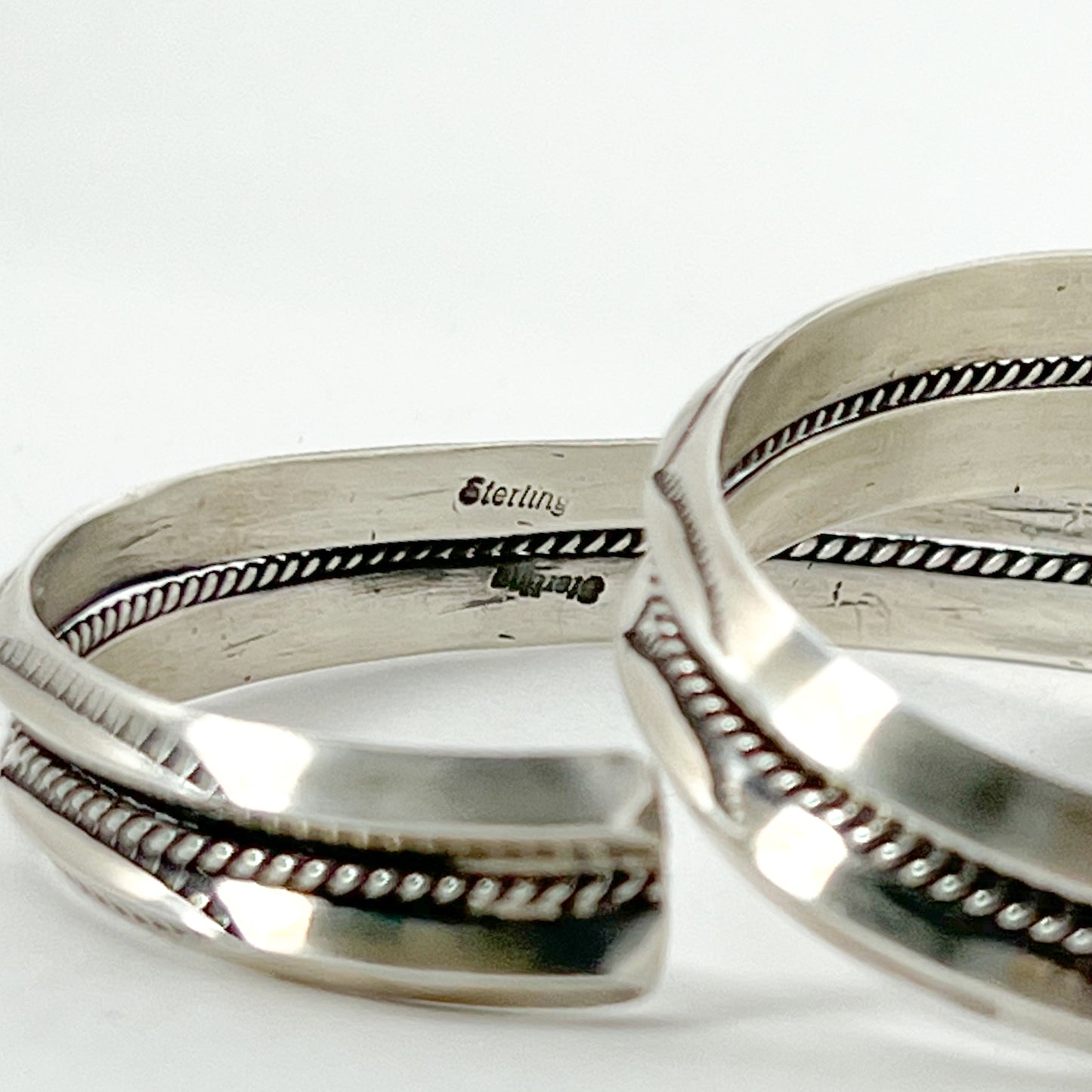 NAVAJO STAMPED SILVER BRACELET by ROBERT CADMAN var.2