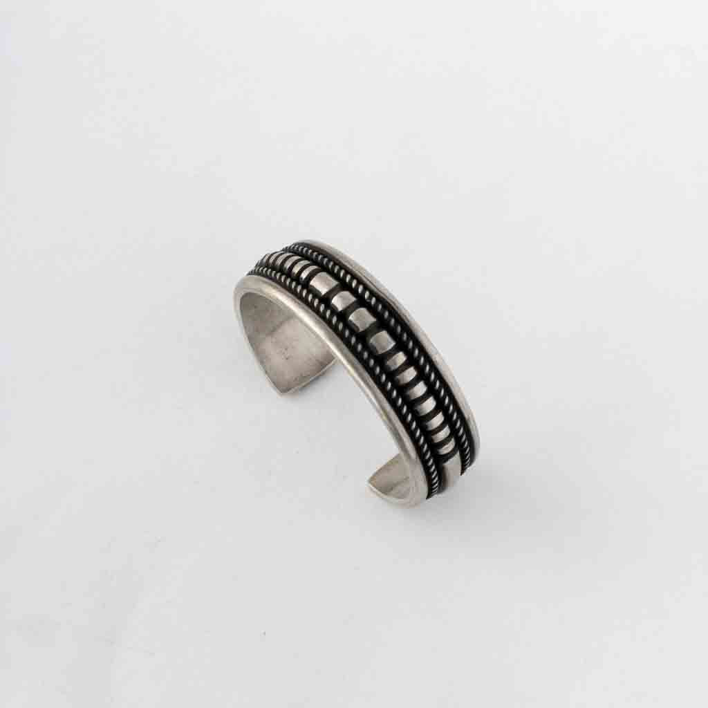 NAVAJO HEAVY STAMPED BRACELET by LEANDER TAHE
