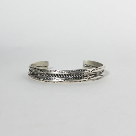 NAVAJO STAMPED SILVER BRACELET by ROBERT CADMAN var.1