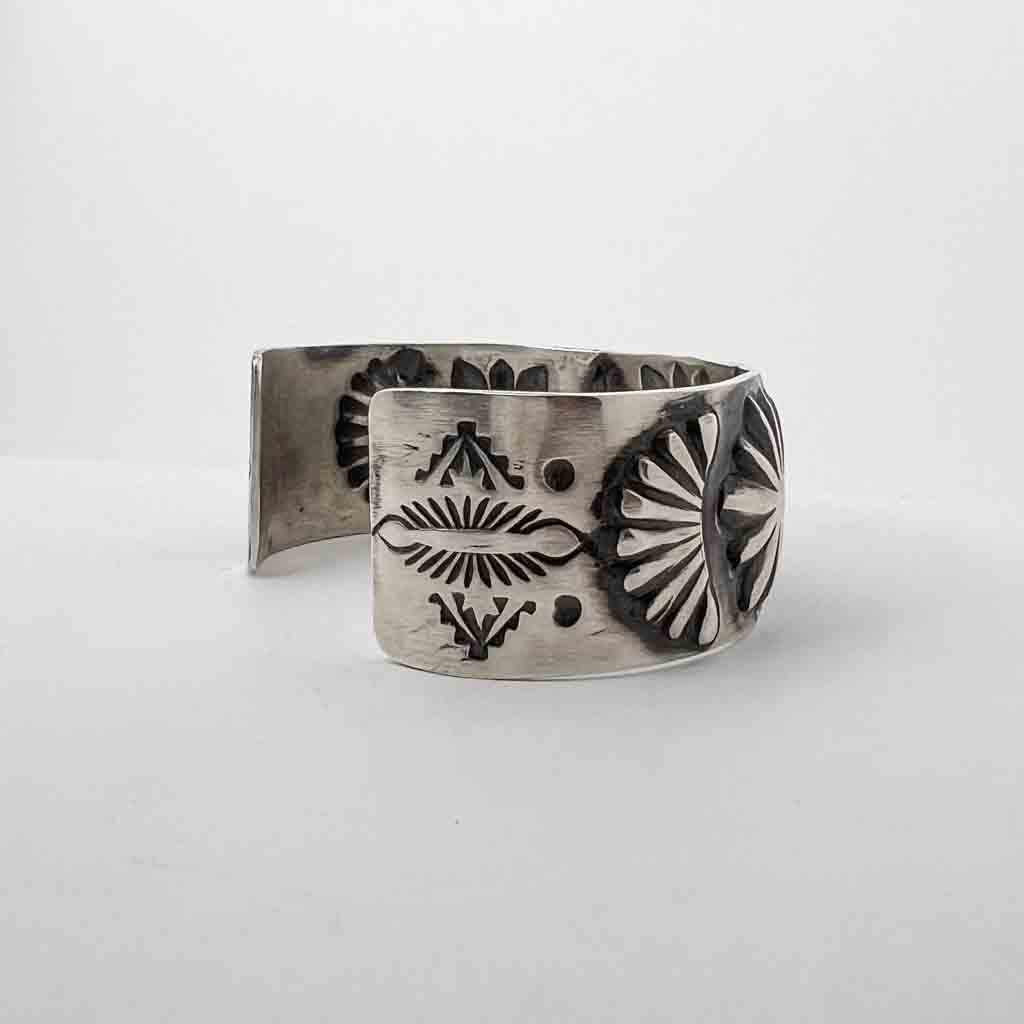 NAVAJO FLOWER STAMPED  BANGLE by ELVIRA BILL