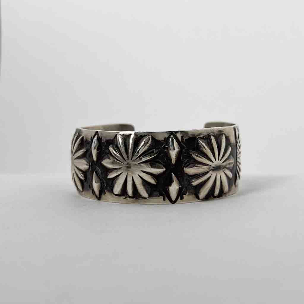 NAVAJO FLOWER STAMPED  BANGLE by ELVIRA BILL
