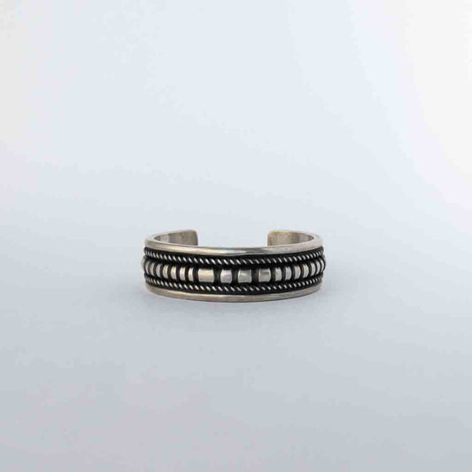 NAVAJO HEAVY STAMPED  BRACELET by LEANDER TAHE